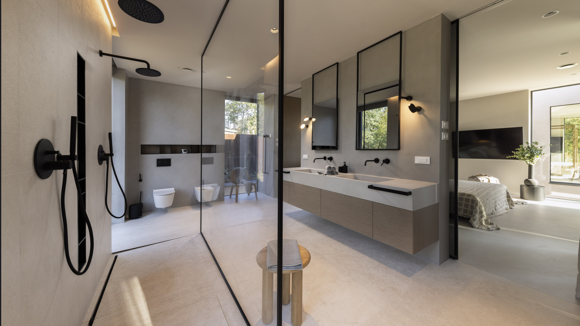 Luxury bathroom with walk-in shower, minimalist design, and open view to bedroom in a modern romantic villa M Istria