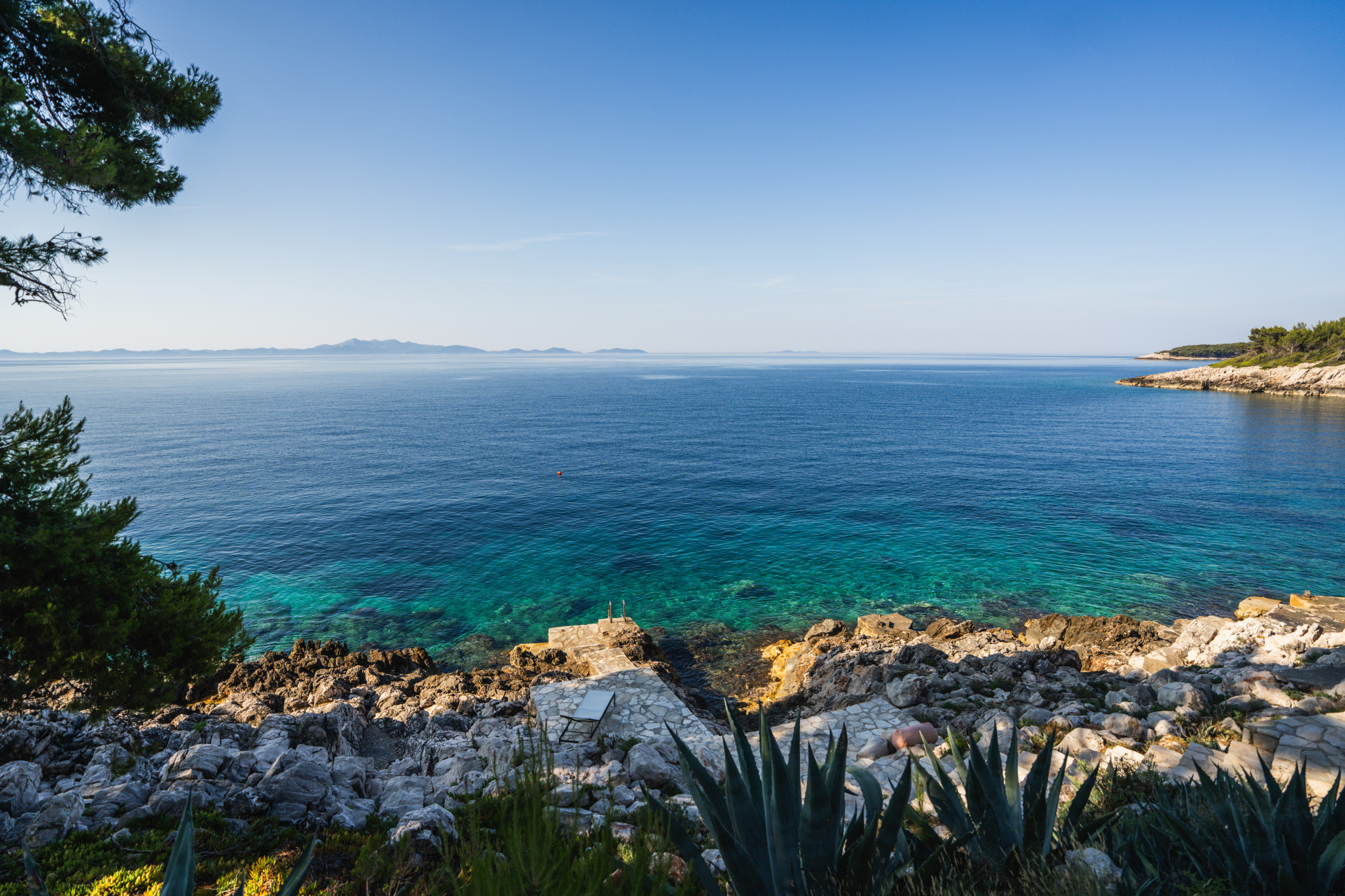 Crystal-clear Adriatic Sea and private rocky waterfront at Villa Sansarea on Korčula Island, Croatia