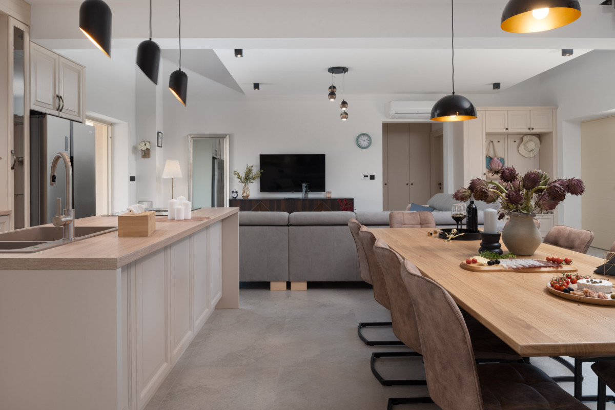 A seamless blend of kitchen, dining, and lounge areas at Villa Utopia