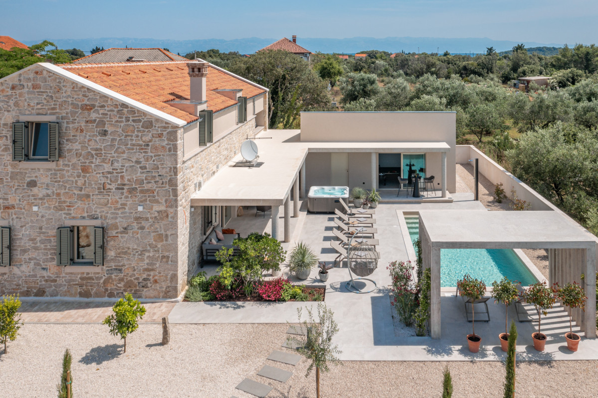 Modern stone Villa Utopia with heated pool and jacuzzi